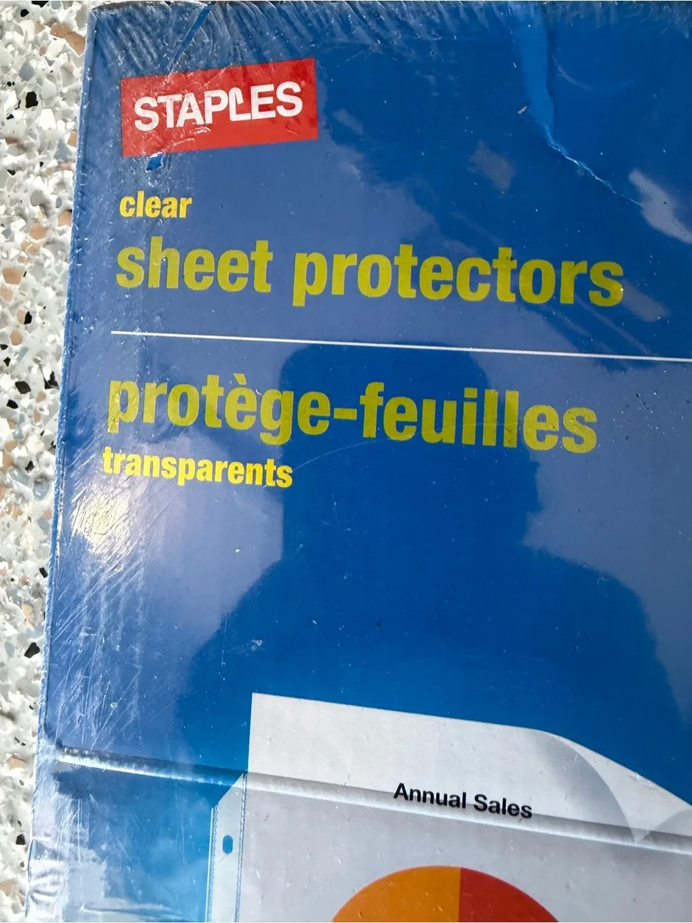Staples blue and yellow clear sheet protectors package